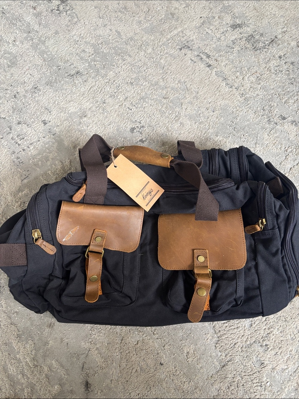 Black Canvas Duffel Bag with Brown Leather Accents